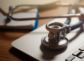 Close-up image of stethoscope on a computer