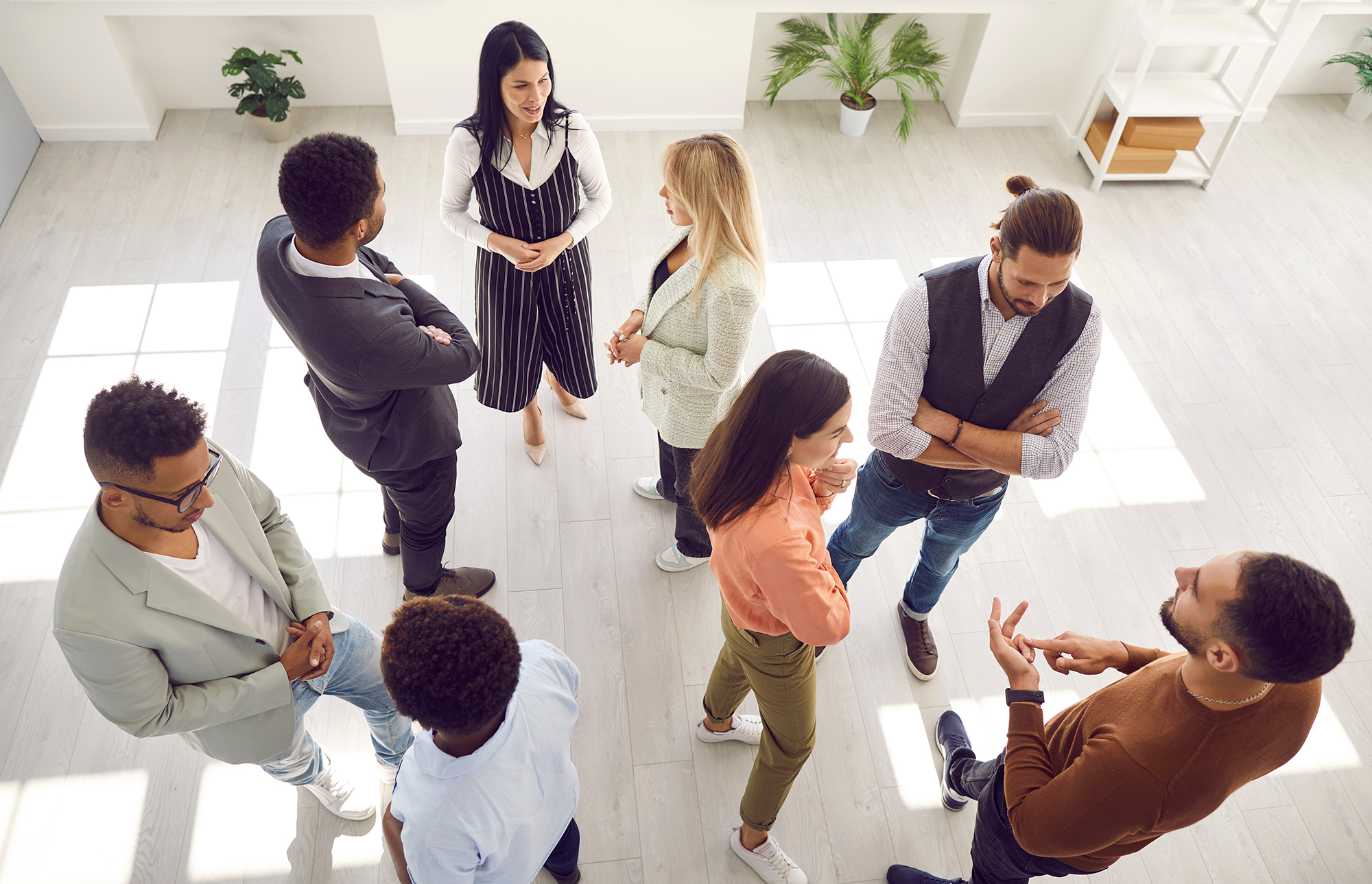 A group of professionals talking at a careers event
