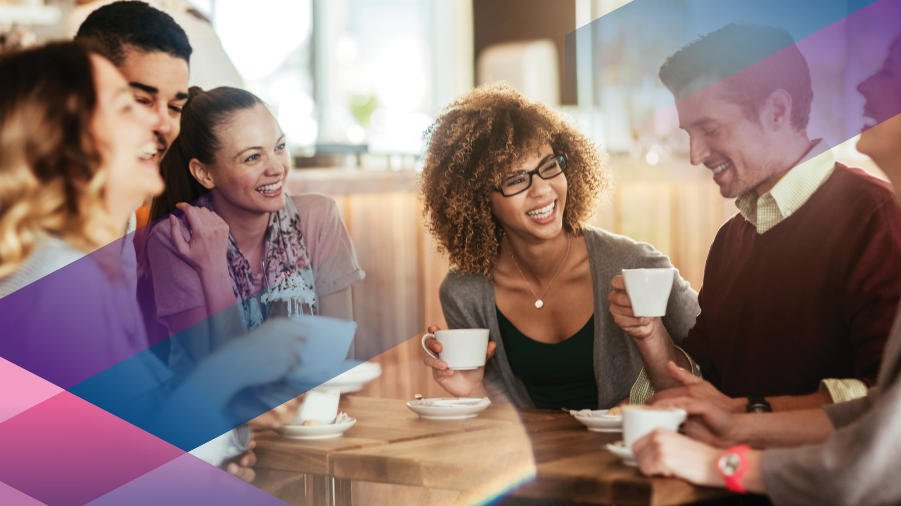 Event hero image, a diverse group of professionals chatting with coffee