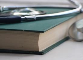 Stethoscope and book