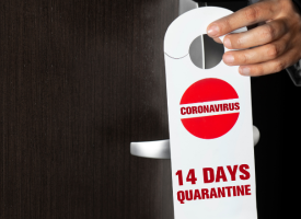 Image of do not disturb sign on hotel door