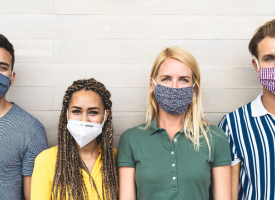 Crowd wearing COVID masks