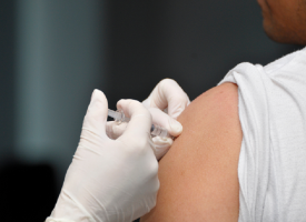 Person receiving vaccine