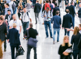 Blurred figures in a crowd