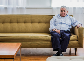 Man on couch waiting for visitors