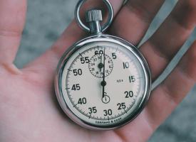person holding stopwatch