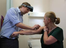 doctor administering vaccine