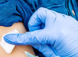 CU arm getting vaccine jab