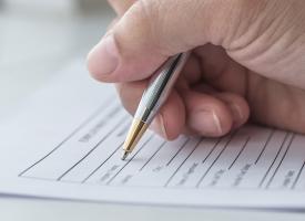 person filling out form