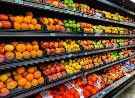 A range of affordable fruit and vegetables displayed at a grocery store