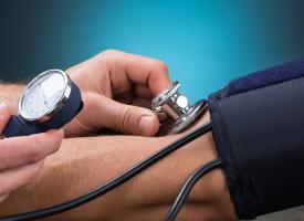 checking blood pressure