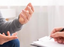 Doctor talking to patient