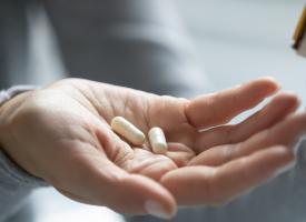 person taking medicine