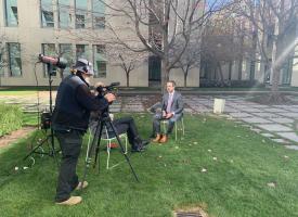 Omar being interviewed at parliament house for the budget 2021