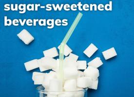 Image of a glass with cubes of sugar spilling out of it with text 'a tax on sugar sweetened beverages'