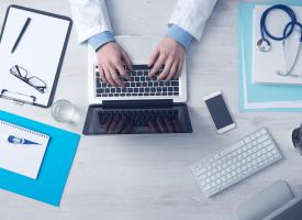 doctor using laptop