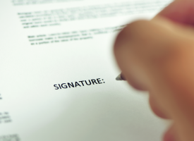 person signing form
