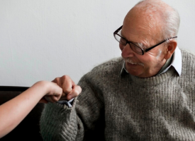 Old man fist bump