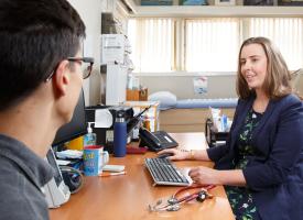 Dr McMullen with a patient in her practice 