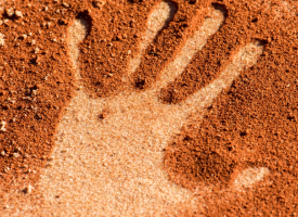 handprint in red earth 