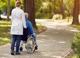 aged care worker caring for patient