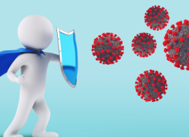 A virtual figure in a cape with a shield fighting back disease cells