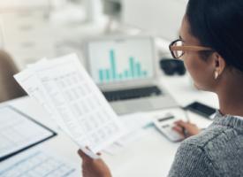 Image of woman looking at paperwork