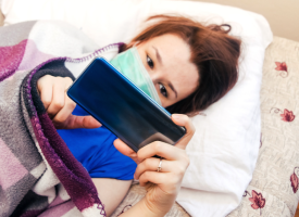 Person sick with phone