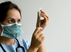 Person preparing vaccine