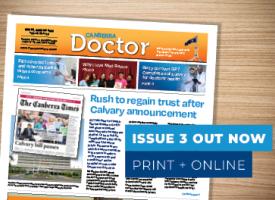 Front page of Canberra Doctor news publication, sitting over a wood texture background, with the words "Issue 3 Out Now ".