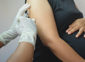 Pregnant women receiving vaccination