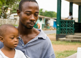 Father and child awaiting medicine