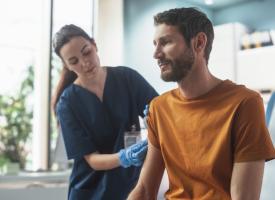 Man receiving vaccine