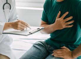 Patient holding chest satellite hospital