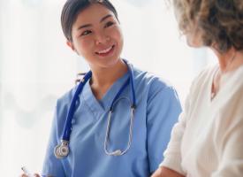 Image of nurse with patient