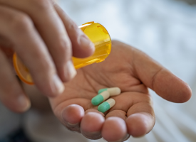 Pills in a patient's hand