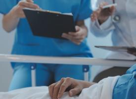 Image of doctors discussing patient