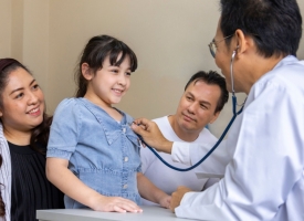 Image of GP with happy family