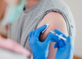 Doctor administering a vaccine