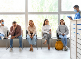 Patients seated in hospital waiting room