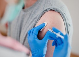 Man receiving vaccine injection