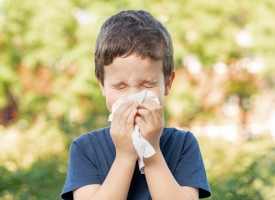 child sneezing