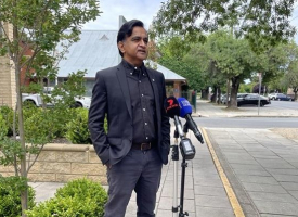 Peter addressing media