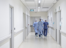surgeons in hospital walking away