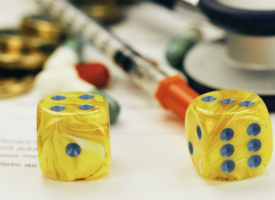 Dice, syringe, and stethoscope