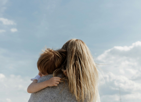 Mum and Young Child Embrace