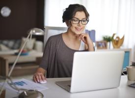 Doctor sitting at computer