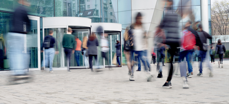 Blurred figures in a crowd