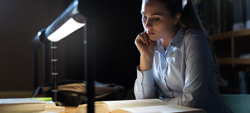 Junior doctor studying at night