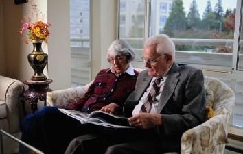 Aged care couple reading